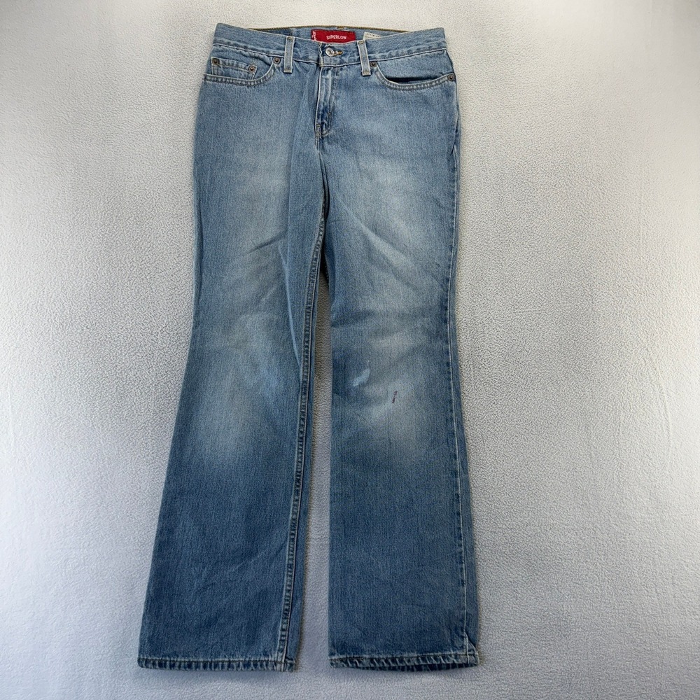 Vintage Levi's jeans Women's 7 Jr Blue Super Low Bootcut Boot Wide Leg Baggy y2k